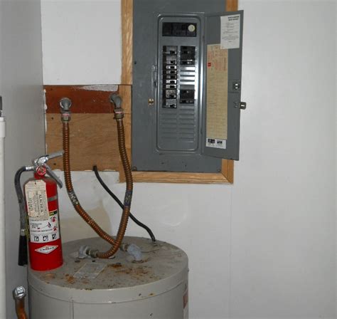 plumbing pipes from electrical panels